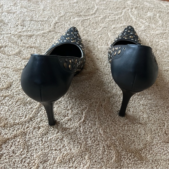 black Calvin Klein heels. Embellished with Gold, silver and brass metal eyelets. - Picture 4 of 5